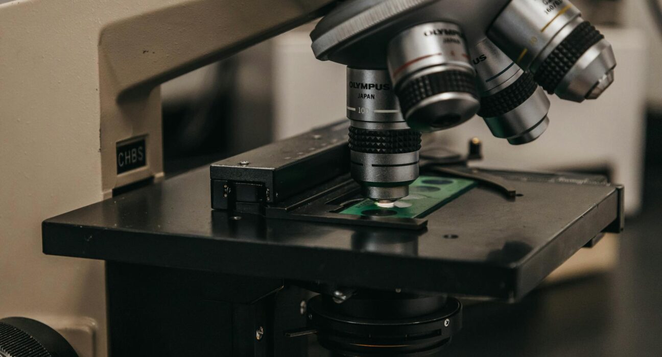 Detailed view of a laboratory microscope, essential for scientific research and analysis.