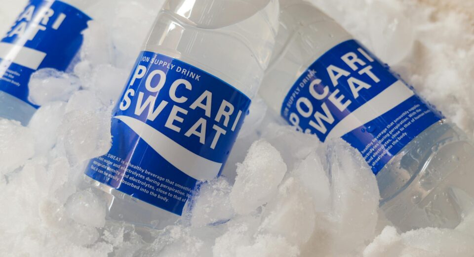 Chilled Pocari Sweat bottles resting in ice, showcasing hydration and refreshment.