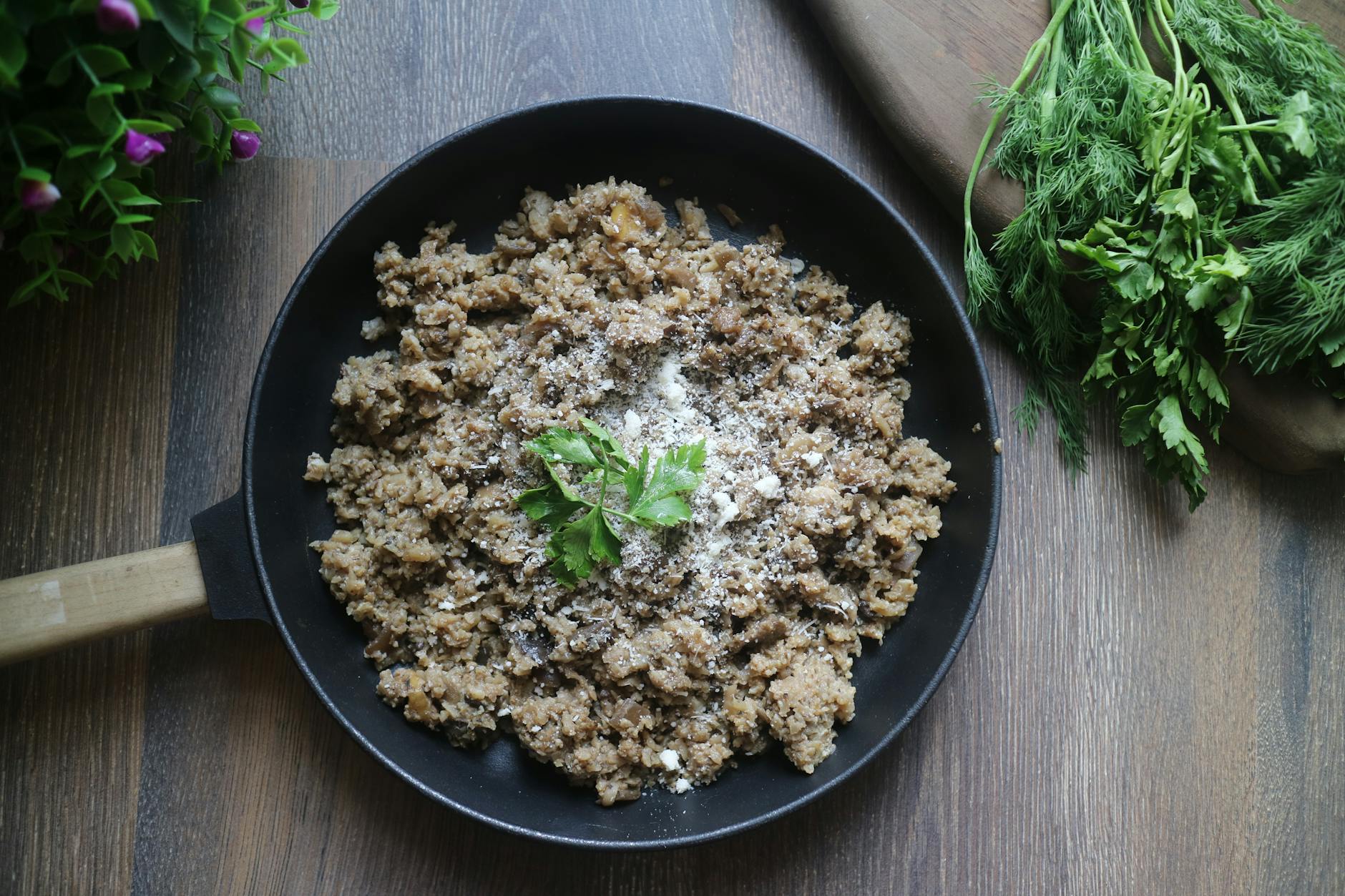 Delicious cauliflower rice dish garnished with fresh herbs, perfect for keto diets.